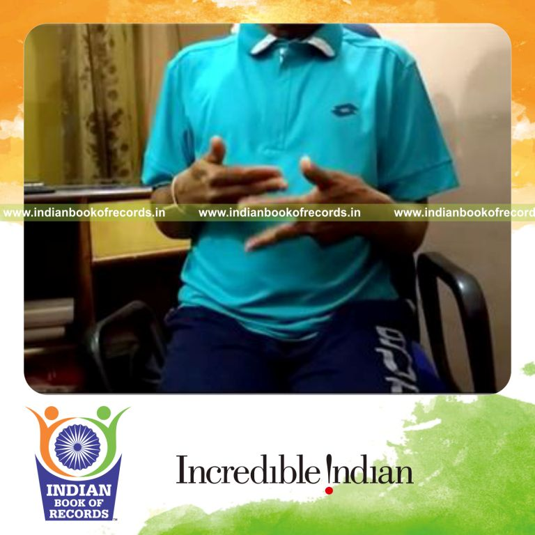 individual performing finger scissors in one minute for record in Indian Book of Records