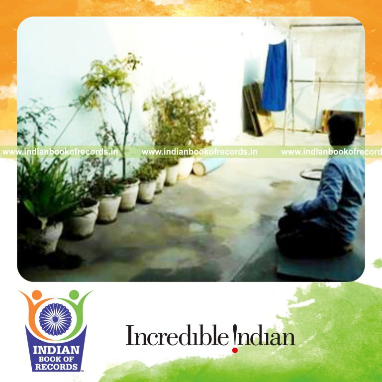 individual bouncing golf ball on tennis racquet alternately while on knees for record in Indian Book of Records