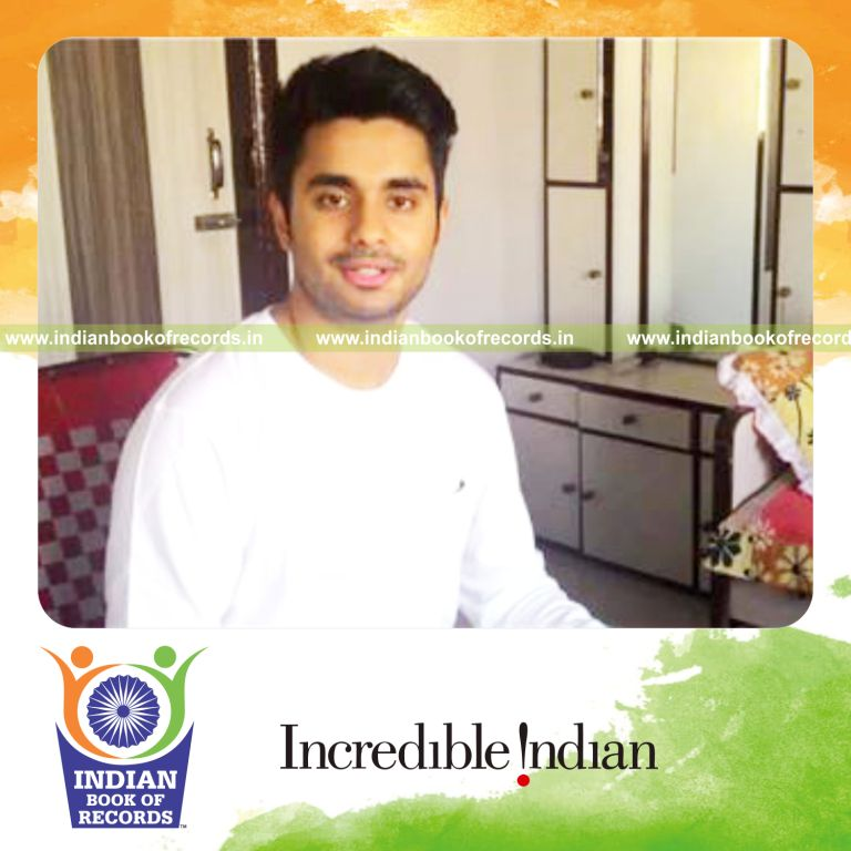 individual drawing hearts while singing within one minute for record in Indian Book of Records