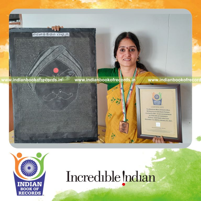 individual female creating maximum micro artwork rice writing for record in Indian Book of Records