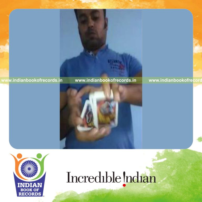 individual performing packet turnover card flourishes in one minute for record in Indian Book of Records