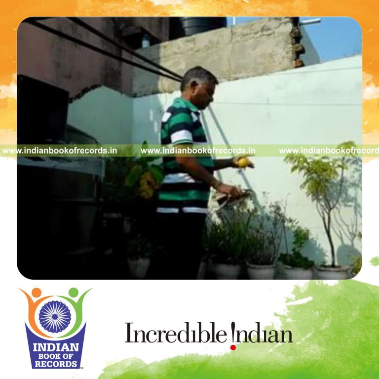 individual bouncing plastic golf ball on shoe for record in Indian Book of Records