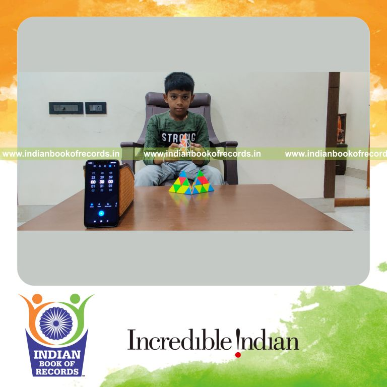 minor male solving pyraminx cubes maximum times in 30 minutes for record in Indian Book of Records