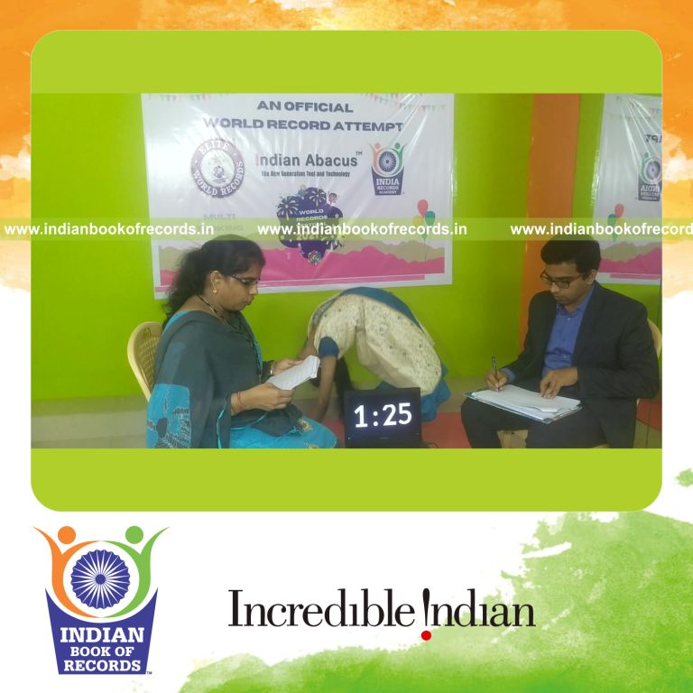 individual female solving single digit addition problems while performing yoga simultaneously for record in Indian Book of Records