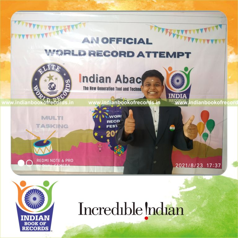individual male solving single digit multiplication problems for Indian Book of Records