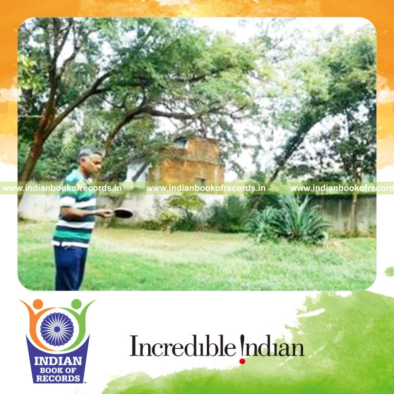 individual bouncing softball on alternate paddle sides for record in Indian Book of Records