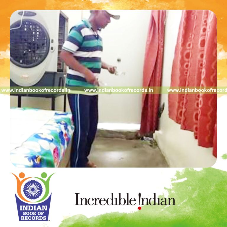 individual bouncing squash ball on two wine bottles for maximum count record in Indian Book of Records