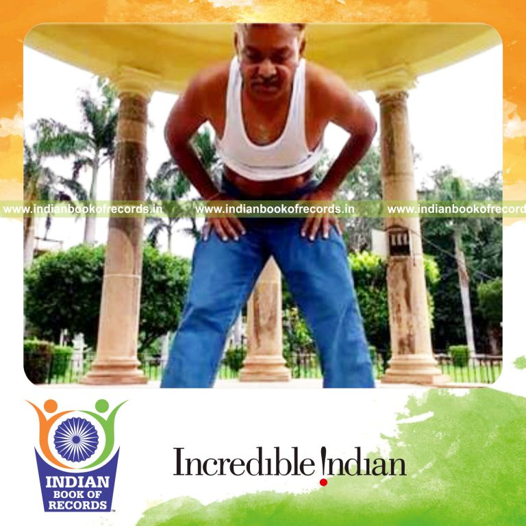 individual performing stomach rolls in 30 seconds for record in Indian Book of Records