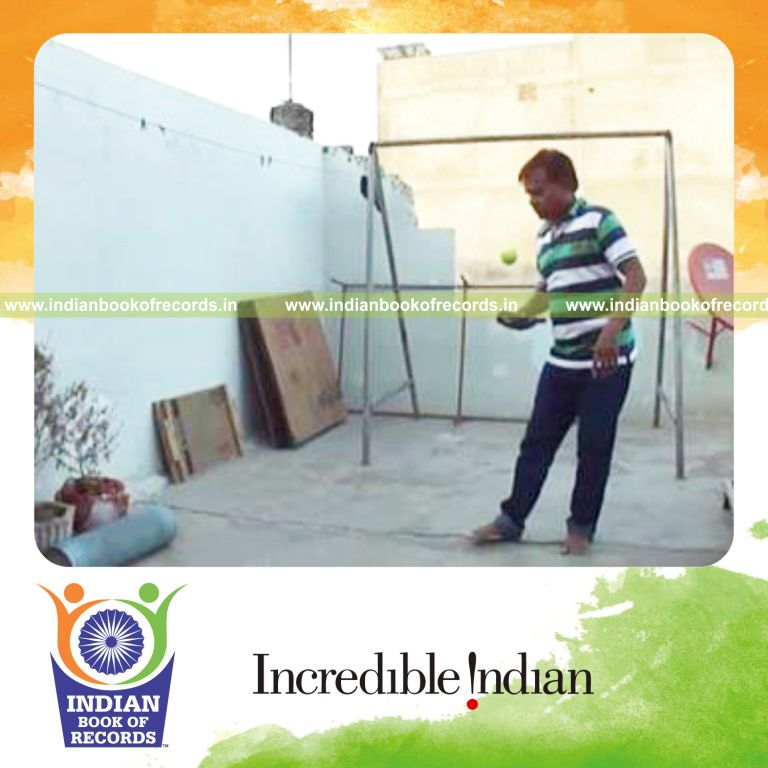 individual bouncing tennis ball alternately on rubber mallet consecutively for record in Indian Book of Records