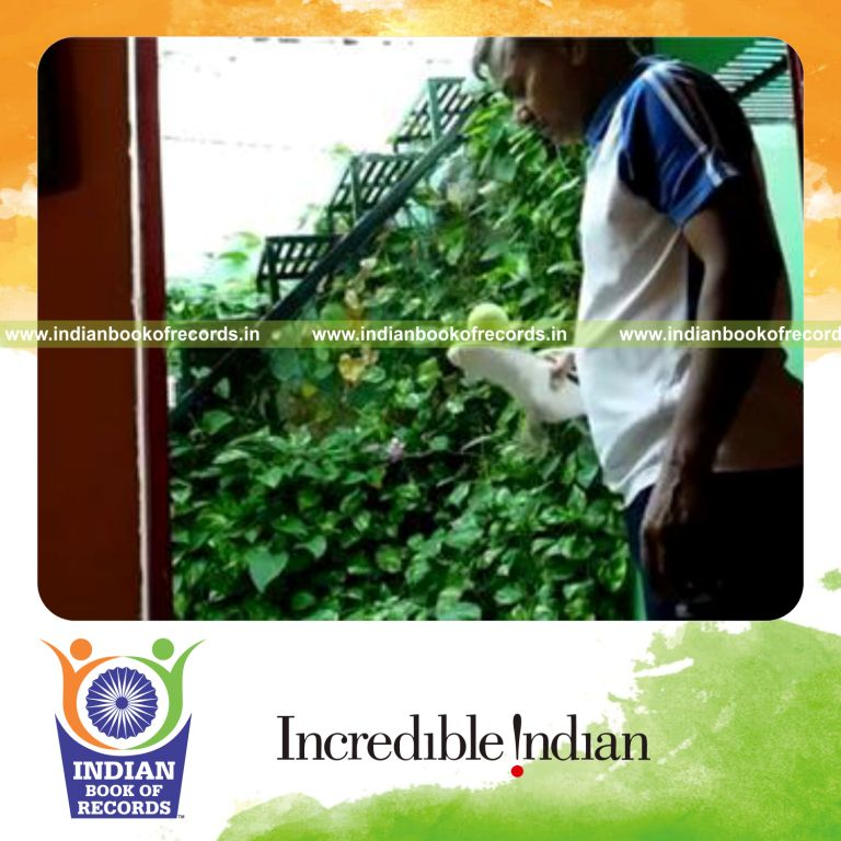 individual bouncing tennis ball off shoe for record in Indian Book of Records