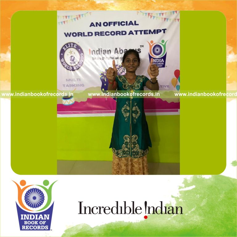 individual female solving two digit mental arithmetic addition and subtraction problems for an Indian Book of Records
