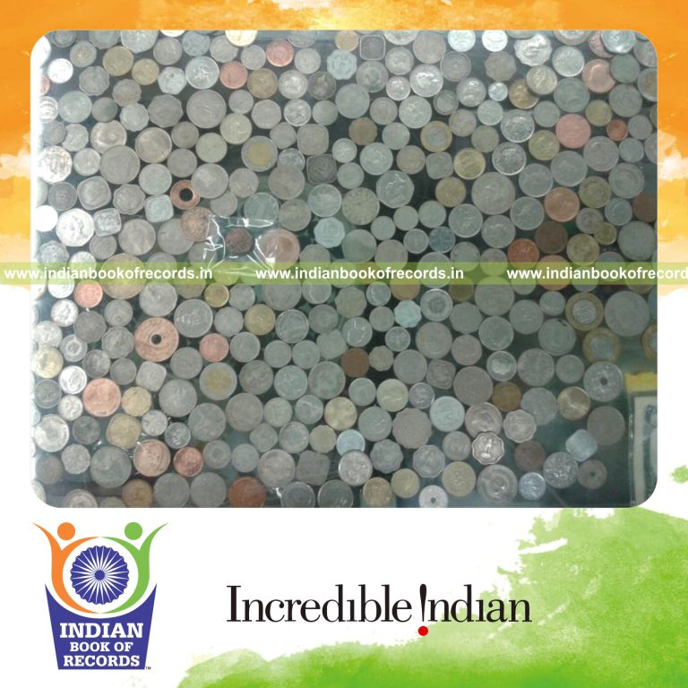 collection of 25 paise coins displayed for Indian Book of Records