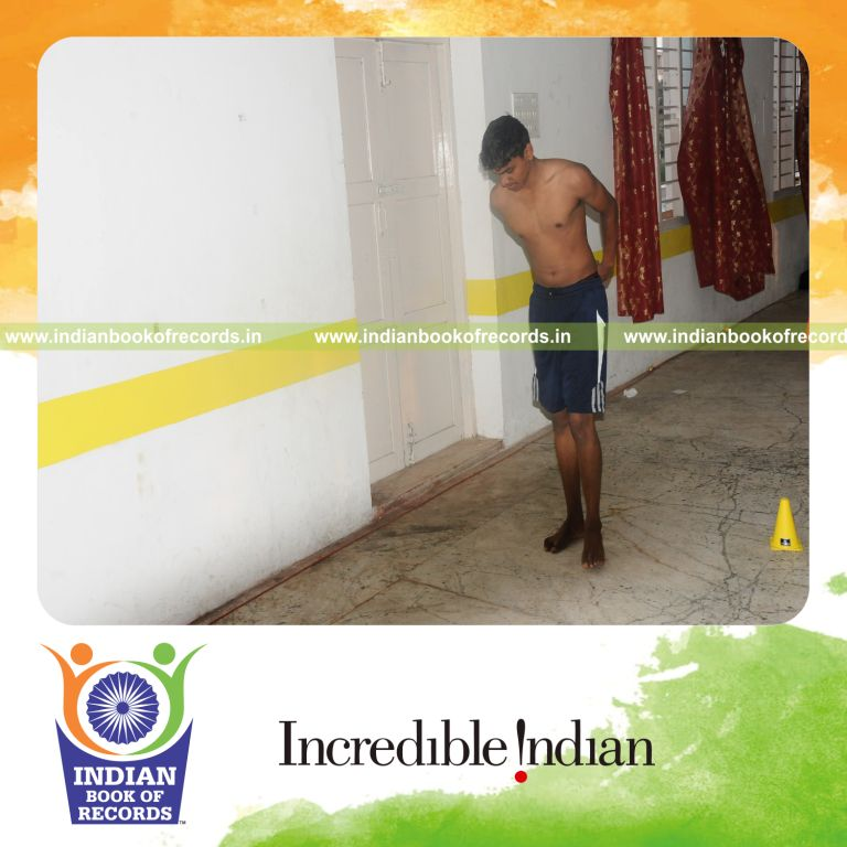 young male performing arm jump rope within thirty minutes for record in Indian Book of Records