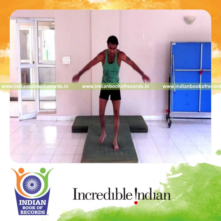 male individual performing back somersaults within one minute for record in Indian Book of Records