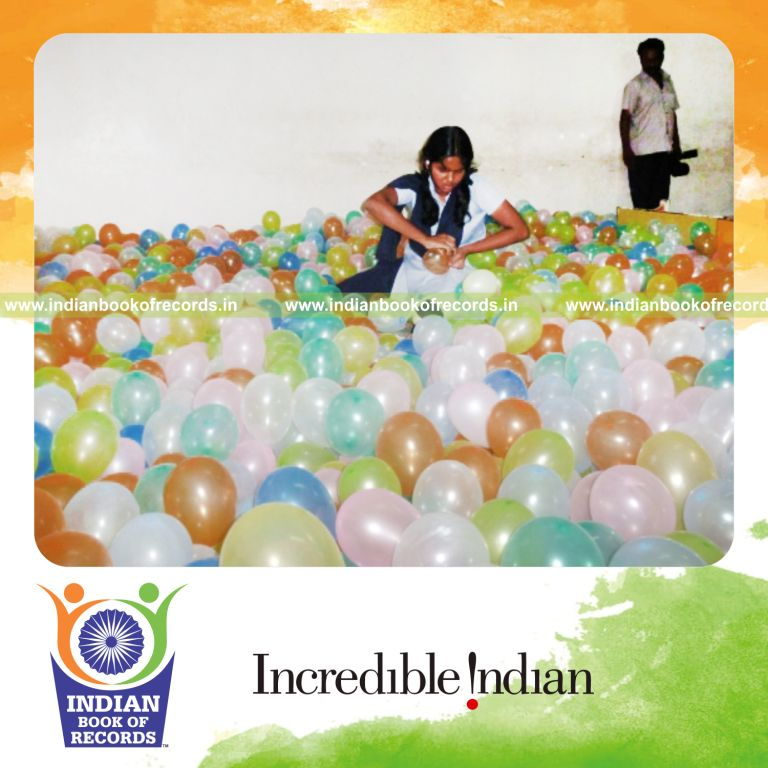 minor female bursting balloons quickly within thirty minutes for Indian Book of Records