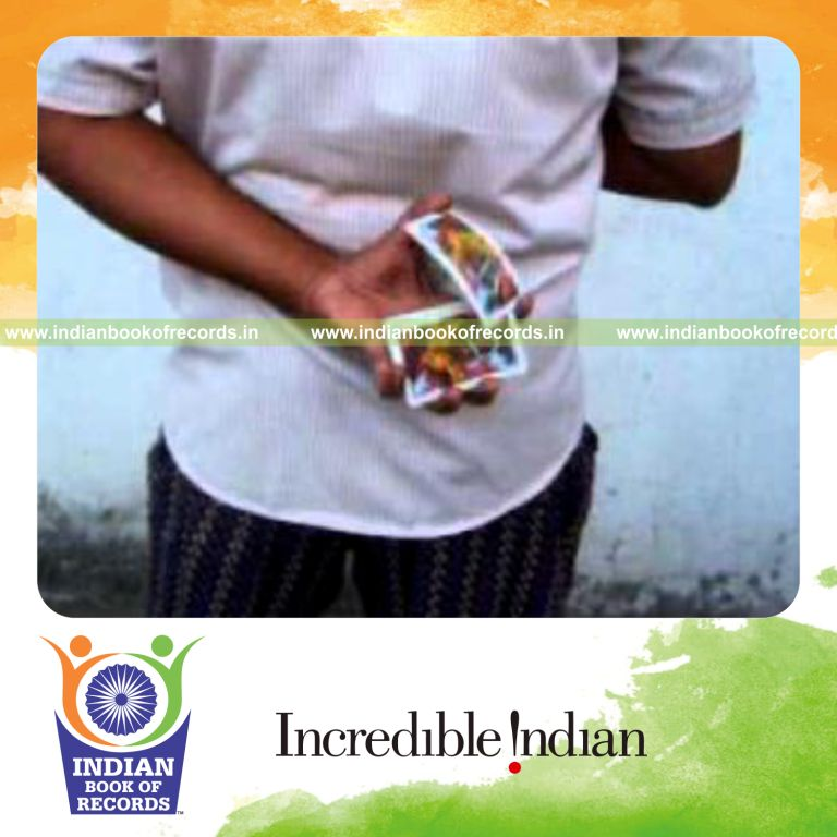 individual performing maximum behind back reverse scissor cuts in 30 seconds for record in Indian Book of Records