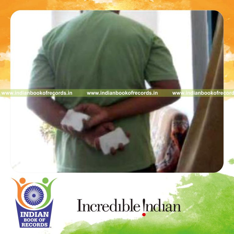 individual performing maximum behind back two handed chen ka cuts in one minute for record in Indian Book of Records