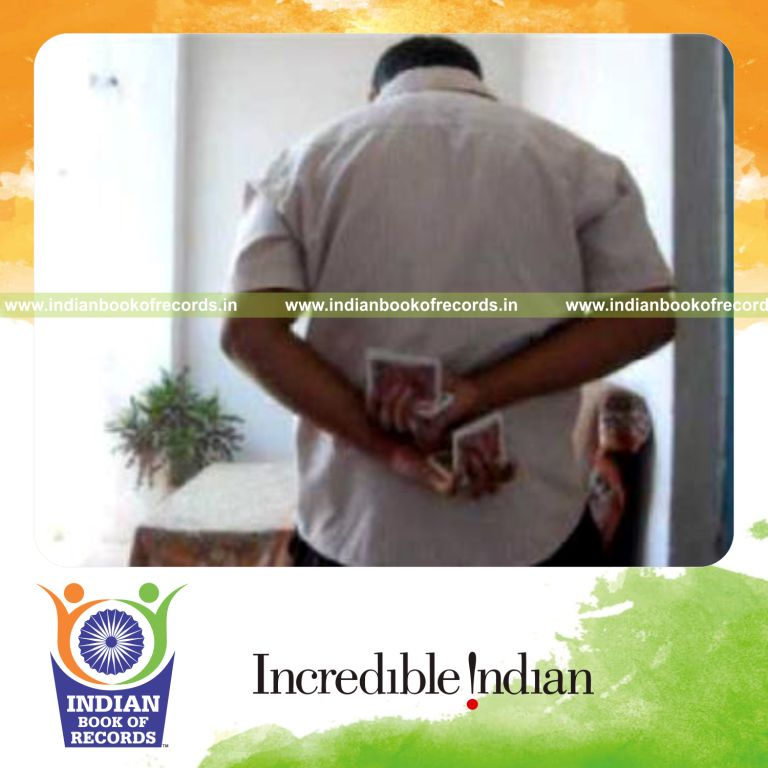 individual performing maximum behind back two handed sabers rollback cuts in 30 seconds for record in Indian Book of Records