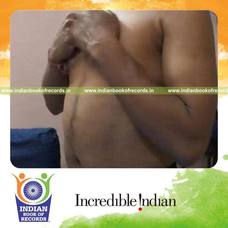 individual hitting chest with fists in one minute for record in Indian Book of Records