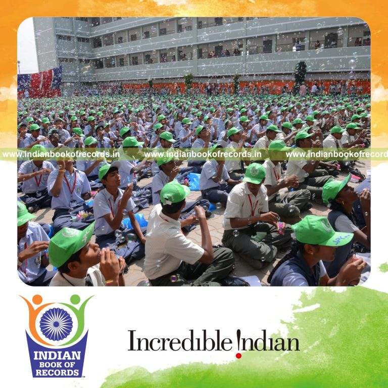 children blowing soap bubbles simultaneously for Indian Book of Records
