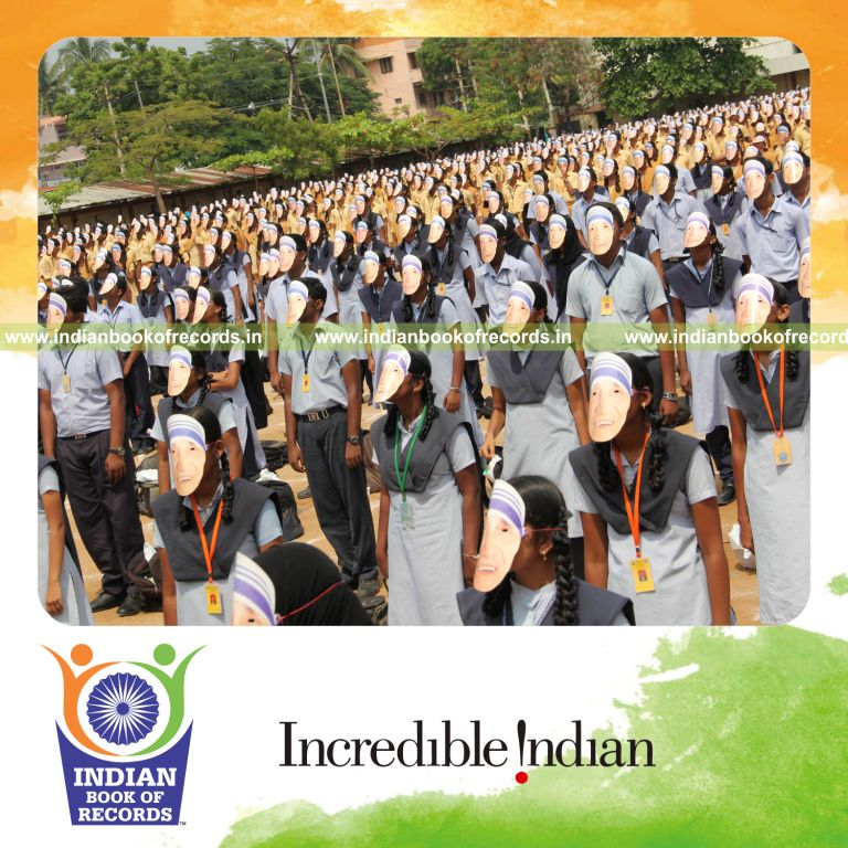 children wearing mother teresa masks together for Indian Book of Records