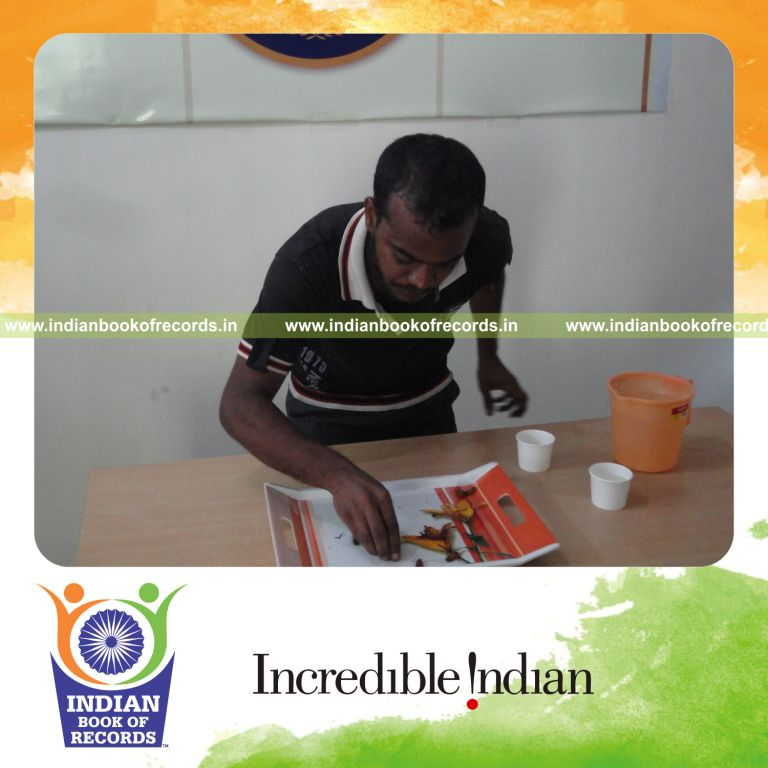 male individual eating cockroaches within 38 seconds for record in Indian Book of Records
