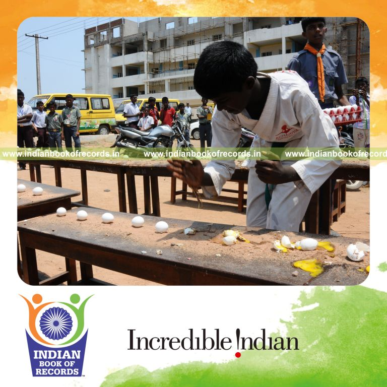 young male crushing eggs with bare hands within thirty minutes for record in Indian Book of Records