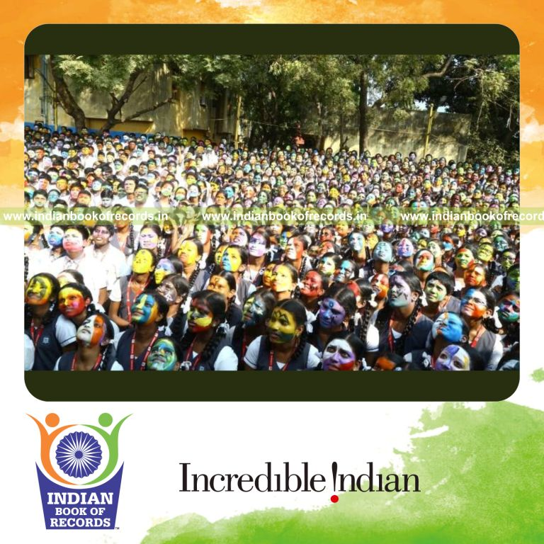 a team painting the highest number of faces within four hours in a coordinated activity for a record in Indian Book of Records