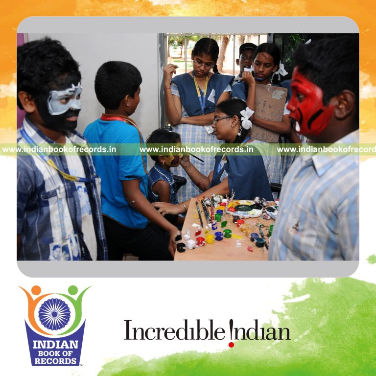 young female creating facial paintings within six hours for record in Indian Book of Records