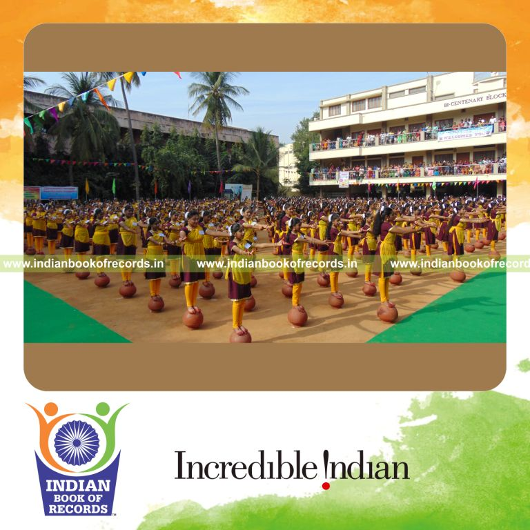 girls performing classical dance on inverted mud pots simultaneously for Indian Book of Records
