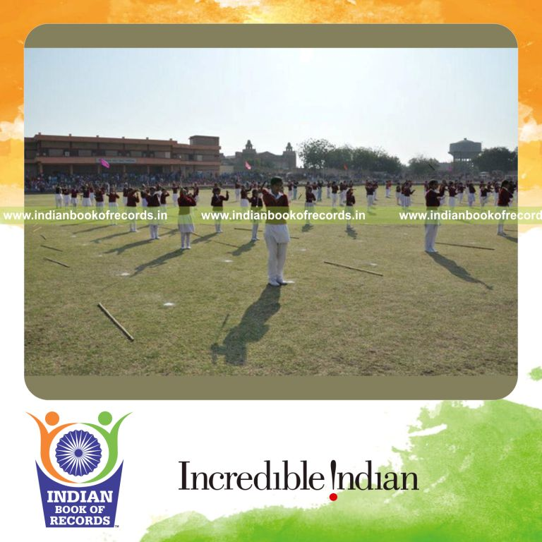 group of girls performing martial art self defense demo simultaneously for record in Indian Book of Records