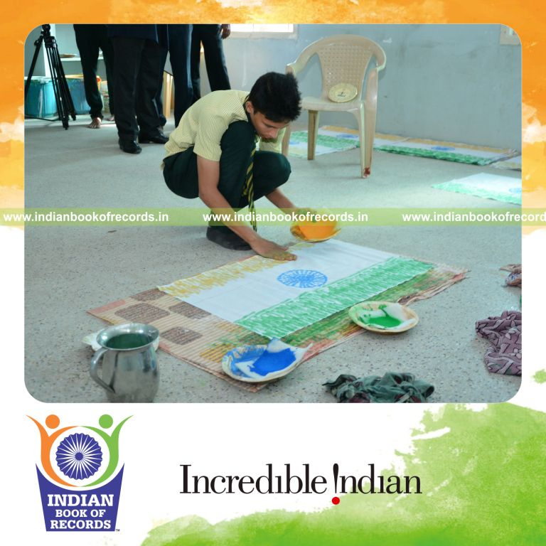 minor male creating multiple indian national flags using fingerprints for Indian Book of Records