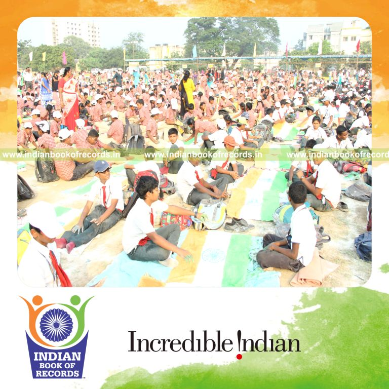 team creating indian national flags using finger painting within three hours for Indian Book of Records