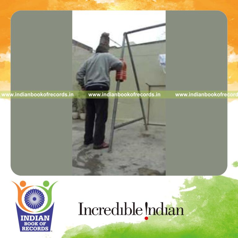 individual performing forearm strikes in one minute for record in Indian Book of Records
