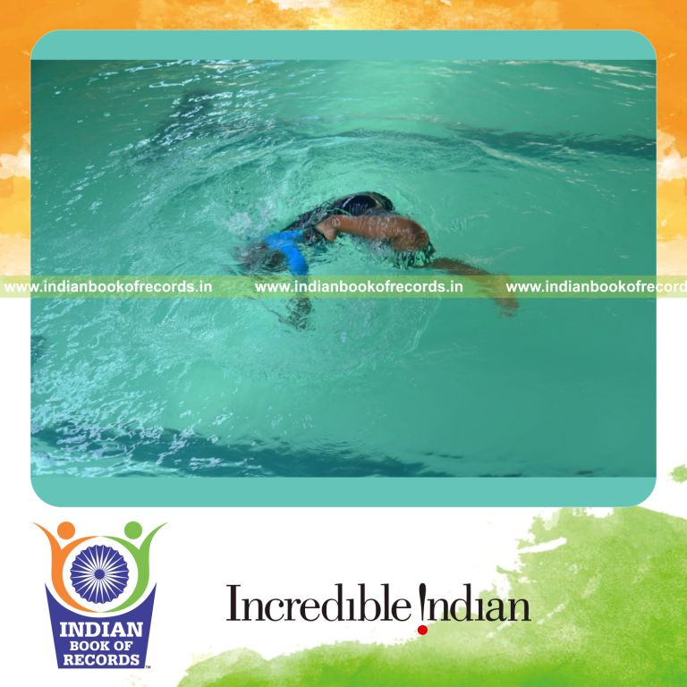 individual minor female performing maximum forward flips in water in 3 minutes for record in Indian Book of Records