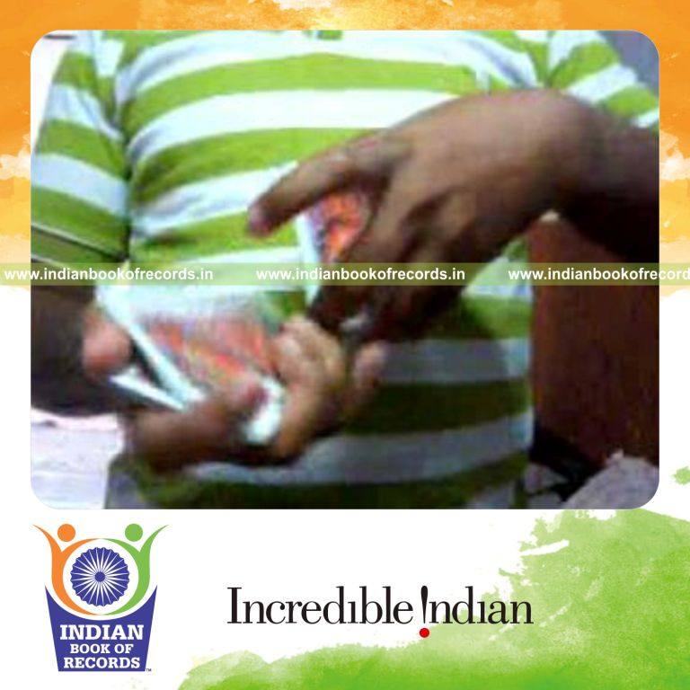 individual performing maximum helix 180 card cuts in one minute for record in Indian Book of Records