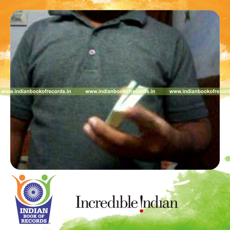 individual performing maximum k town flip card cuts in 30 seconds for record in Indian Book of Records