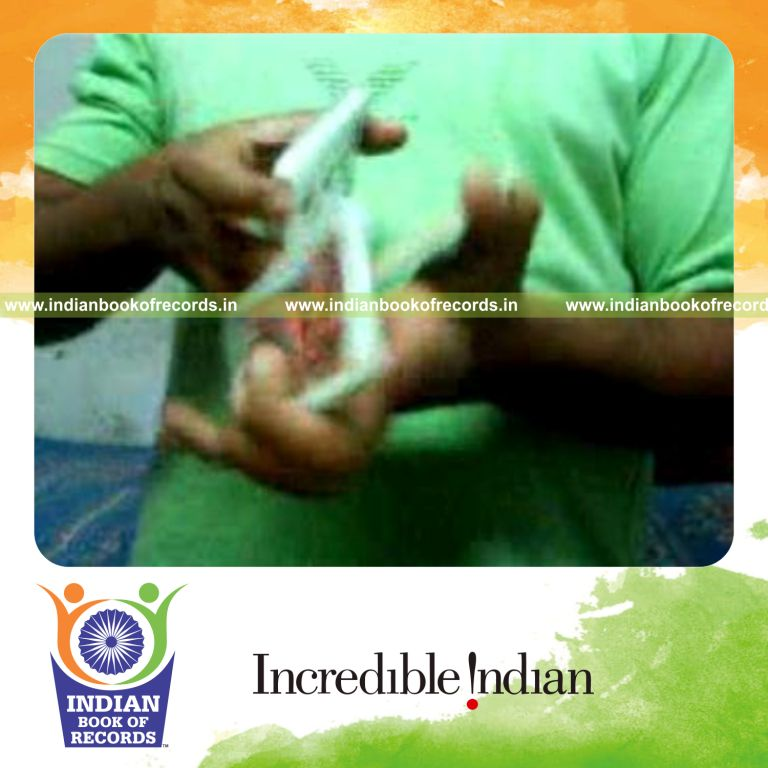 individual performing maximum keo kuts card cuts in 30 seconds for record in Indian Book of Records