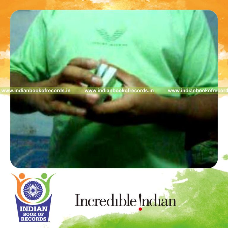 individual performing maximum keo kuts card cuts in one minute for record in Indian Book of Records