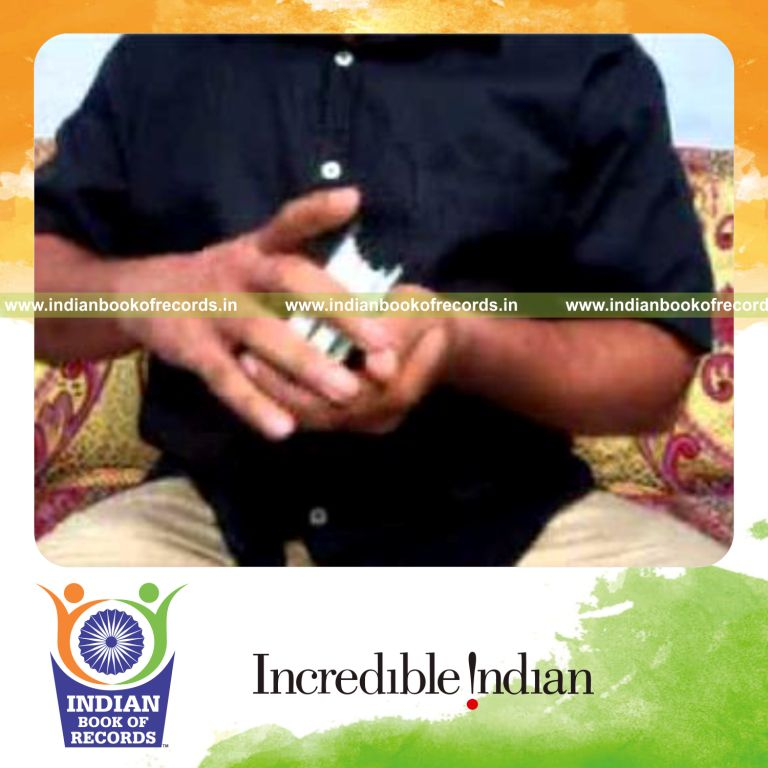 individual performing keo kuts card cuts using double deck in 30 seconds for record in Indian Book of Records