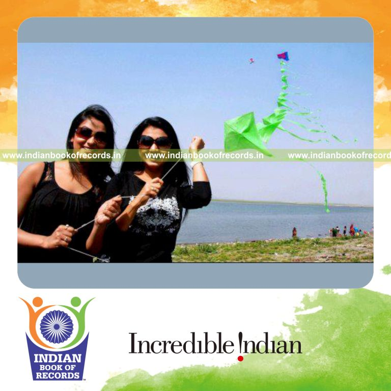team flying multiple kites on a single string for record in Indian Book of Records