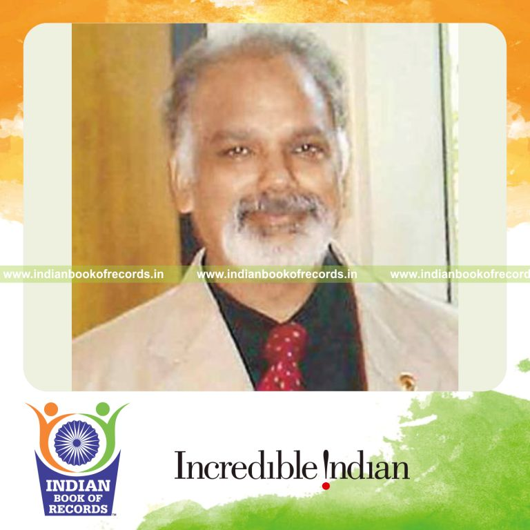 male individual collecting multiple lapel pins for record in Indian Book of Records