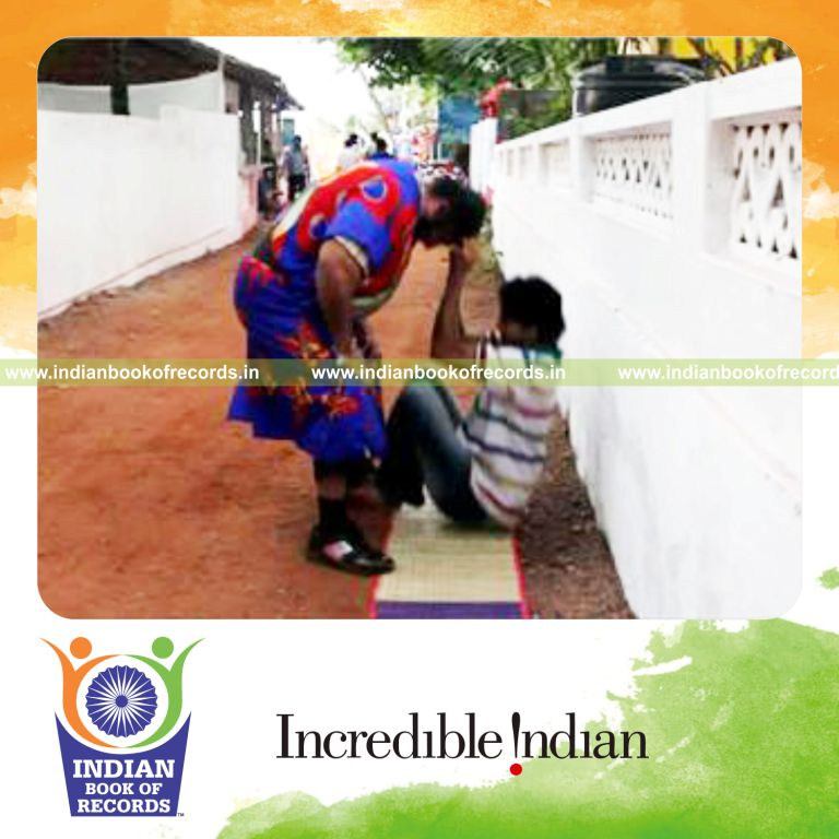 individual lifting 60kg person using hair for maximum times for record in Indian Book of Records