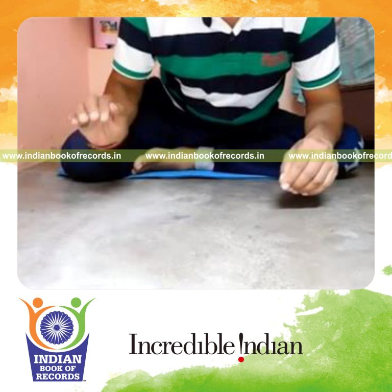 individual dribbling marble multiple times in 30 seconds for record in Indian Book of Records