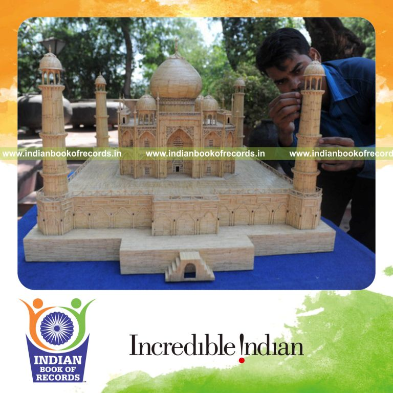 male individual creating taj mahal replica using matchsticks for record in Indian Book of Records