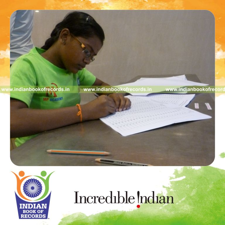 minor female solving division problems rapidly for Indian Book of Records