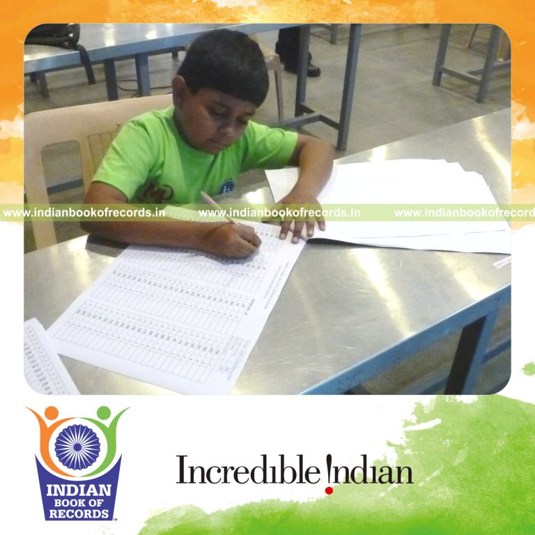 minor male solving division problems quickly for Indian Book of Records