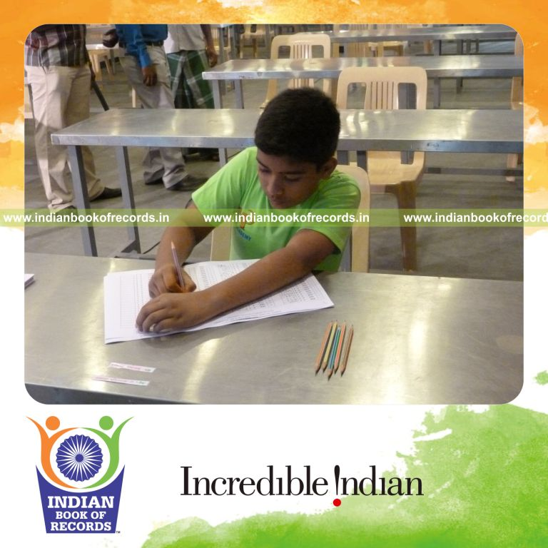 minor male solving multiplication problems for Indian Book of Records
