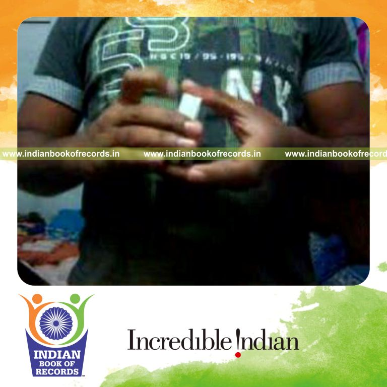 individual performing maximum muse card cuts in 30 seconds for record in Indian Book of Records