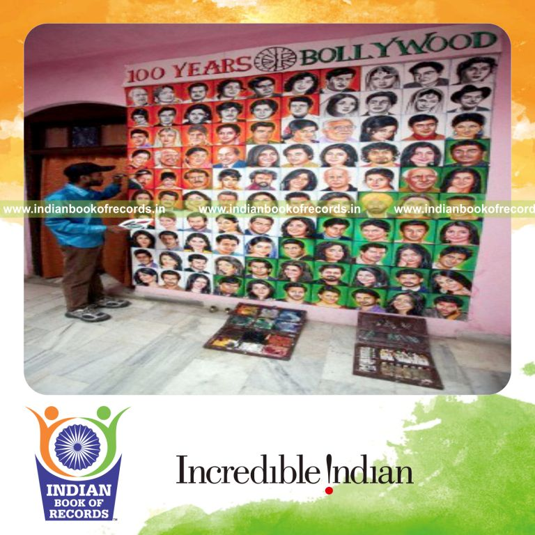 male individual drawing portraits of bollywood stars for record in Indian Book of Records